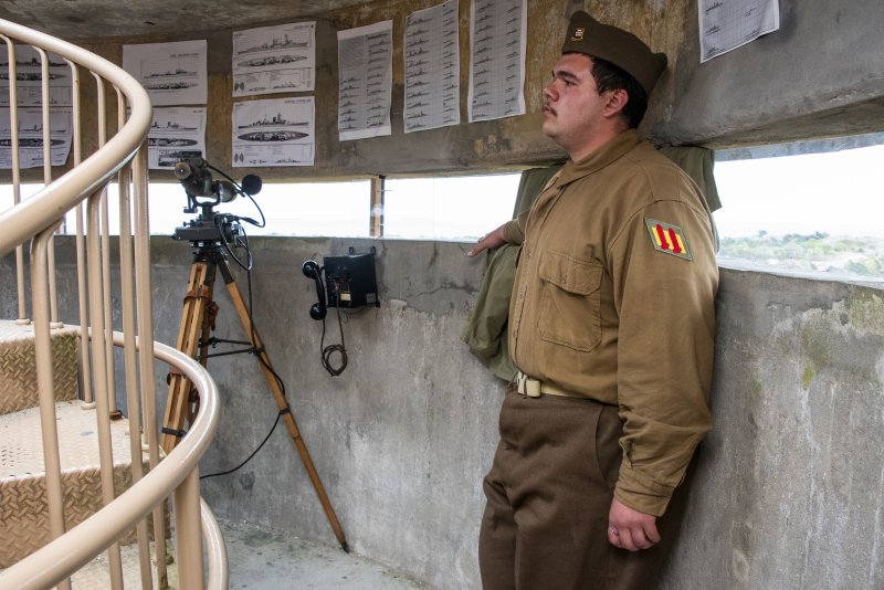Mike Rivera of York, Pa., takes his position in the World War II tower during the Fort Miles Defense Day event.
